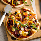 Chorizo and rocket pizzas