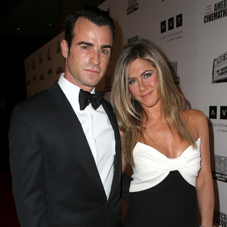Jennifer Aniston beams in monochrome Valentino gown