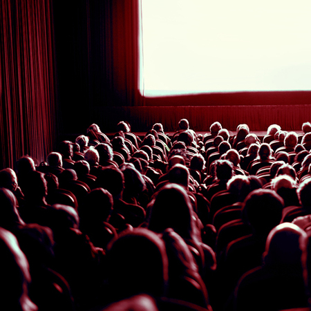 Crowd watching movie at rhe cinema
