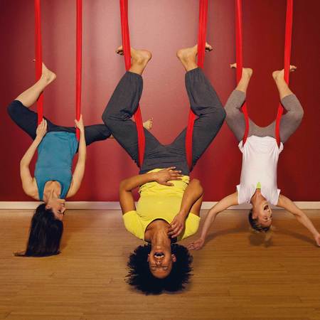 vertical yoga working out with friends