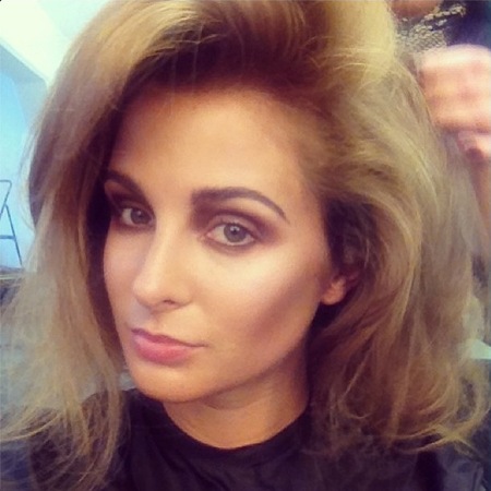 Millie Mackintosh works dramatic make-up for new shoot