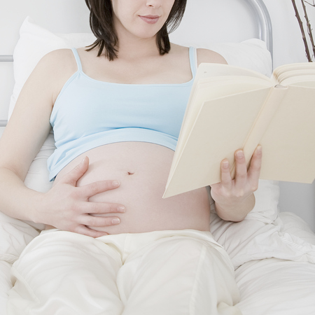 pregnant woman reading