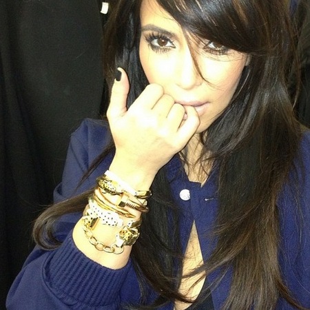 Kim Kardashian does matt black nails
