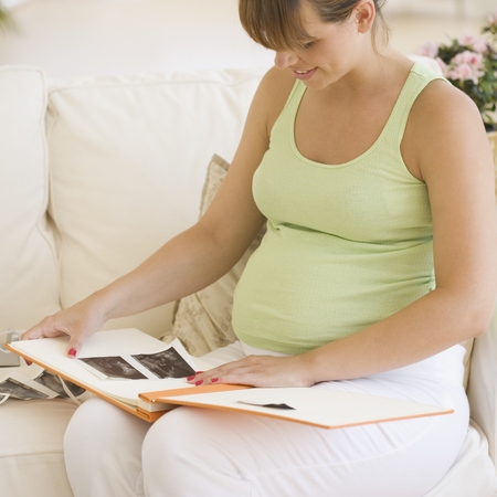 pregnant woman scrapbooking