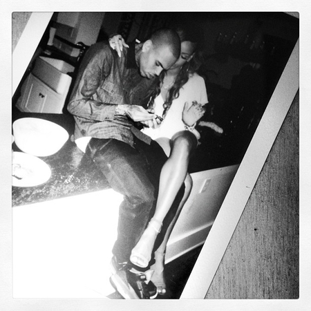 Rihanna and Chris Brown get cosy on her birthday