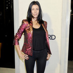 Liberty Ross shimmers in metallic blazer for Tom Ford cocktails 