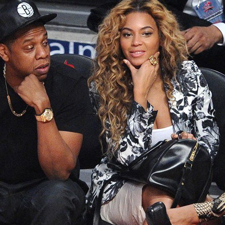 Beyonce with Saint Laurent Duffle handbag