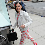 Jessie J styles up floral onesie with white biker jacket