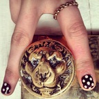 NAIL ART: Cara Delevingne rocks monochrome spots