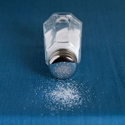 A salt shaker on a table