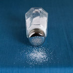 A salt shaker on a table