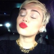 Miley Cyrus wears Chanel necklace