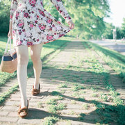 Girl walking in flowery dress
