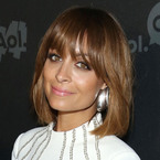Nicole Richie in white dress with brown bob and fringe