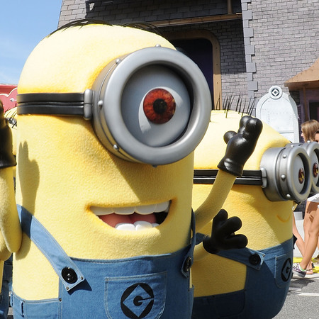 Characters of animated movie 'Despicable Me' poses during the Grand Opening of Despicable Me Minion Mayhem at Universal Orlando