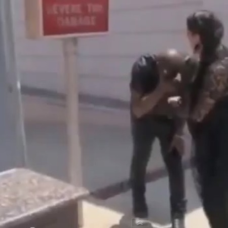Kanye West walks into a pole
