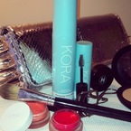 Miranda Kerr Met Ball clutch bag and makeup