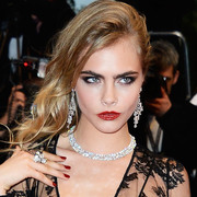 CANNES: Cara Delevingne hits Great Gatsby red carpet in plunging Burberry dress