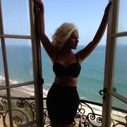 Christina Aguilera wearing a bra and skirt after weight loss