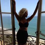 Christina Aguilera wearing a bra and skirt after weight loss