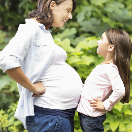 Pregnant woman and daughter