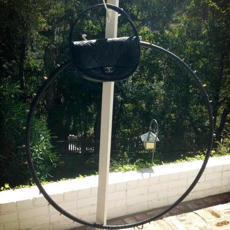 Kelly Osbourne's Chanel Hula Hoop handbag and studded hula hoop
