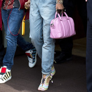 Rihanna wears Topshop dungarees, pink Givenchy bag and Sophia Webster heels