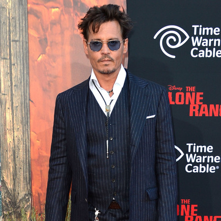 Johnny Depp in Ralph Lauren at 'Lone Ranger' Premiere