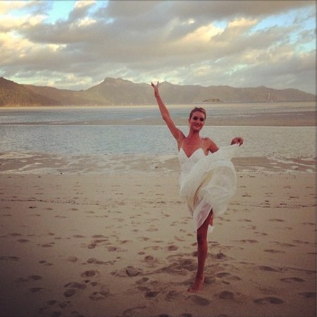 Rosie Huntington-Whiteley wears floaty white dress
