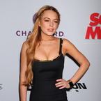 Lindsay Lohan arrives at the 'Scary Movie V' Los Angeles premiere at ArcLight Cinemas Cinerama Dome on April 11, 2013 in Hollywood,
