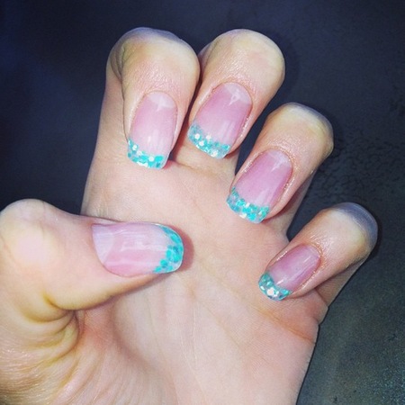 Jessie J green glitter French tips nail art