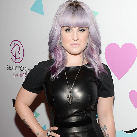 Kelly Osbourne in leather dress with new fringe