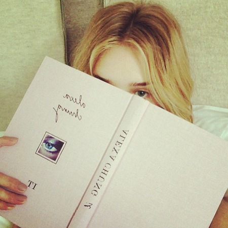 Rosie Huntington Whiteley reading It by Alexa Chung