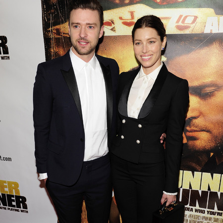 Justin Timberlake and Jessica Biel in matching suits at Runner Runner premiere