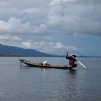 Man on boat fishing, Burma