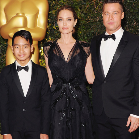 angelina jolie in black lace versace dress - Angelina and Brad Pitt with son Maddox 0 governors ball awards 2013 - handbag.com