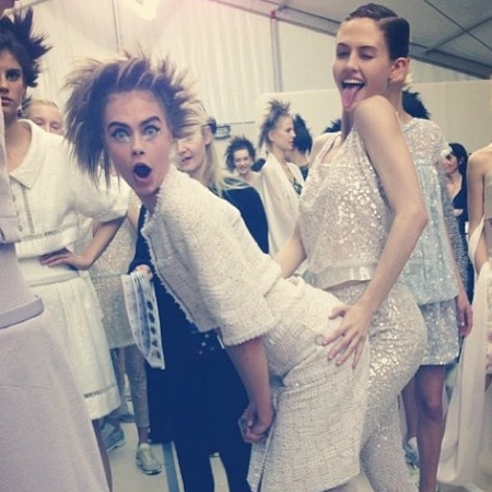 Cara Delevigne backstage at Chanel Couture fashion show in Paris 2014 - fashion show - corset waists video - Chanel - Karl Lagerfled - fashion news - model's bodies - life news - handbag.com
