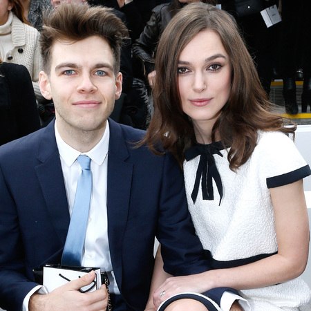 Keira Knightley at Chanel Paris Fashion Week show with James Righton - corseted Chanel dress - tiny waist - celebs figures - celebrity bodies - fashion news - handbag.com