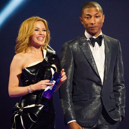Kylie Minogue with pharrell_ williams at Brits - album launch kiss me once - facebook HQ 2014 - relationships - shopping bag - handbag.com