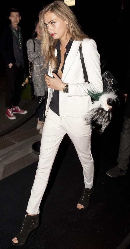 cara delevingne white suit and sheer black shirt - mulberry backpack bag and fendi karl lagerfeld bag pom pom - celebrity fashion and designer handbags - handbag.com