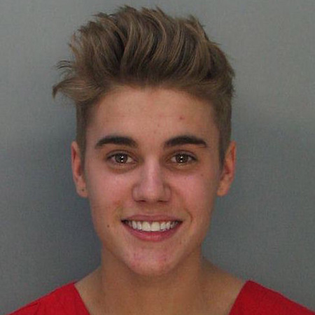 Justin Bieber booking photo - police station - celebrities drink driving - day bag - handbag.com