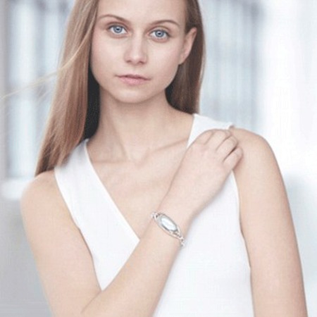 guardian angel jewellery to get you out of a bad date - girl wearing the bracelet - evening bag - handbag
