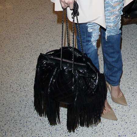 khloe kardashian LAX airport - fresh reports about Lamar - cryptic message - celeb news - day bag - handbag.com