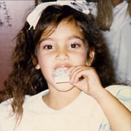 Kim Kardashian - awkward childhood photos - stylish celebrities - baby feature - baby news - handbag.com
