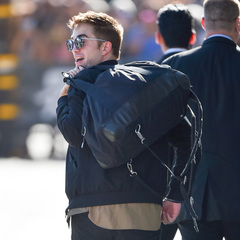 Robert Pattinson carries black duffel bag - Robert Pattinson fashion - celebrity street style - celebrity spots - #HandbagSpy - shopping bag news - handbag.com