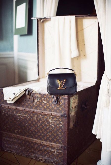 How to store and organise your handbags in your wardrobe - wardrobe decluttering - fashion organisation - wardrobe how to - home ideas - feature - shopping bag - handbag.com