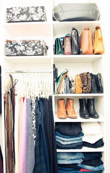 How to store and organise your handbags in your wardrobe - wardrobe decluttering - fashion organisation - wardrobe how to - home ideas - feature - shopping bag - handbag.com
