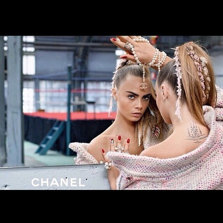 cara delevingne-chanel autumn winter 2014 ad campaign-chanel necklace-pink tweed dress-ponytail trend-handbag.com
