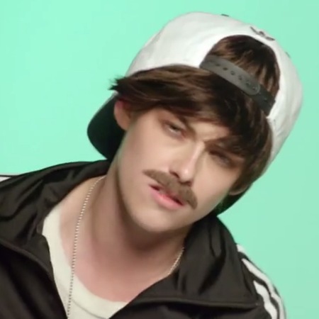 Kristen Stewart laughs off Robert Pattinson breakover rumours in funny video - kristen stewart wearing a moustache and tracksuit - day bag - handbag